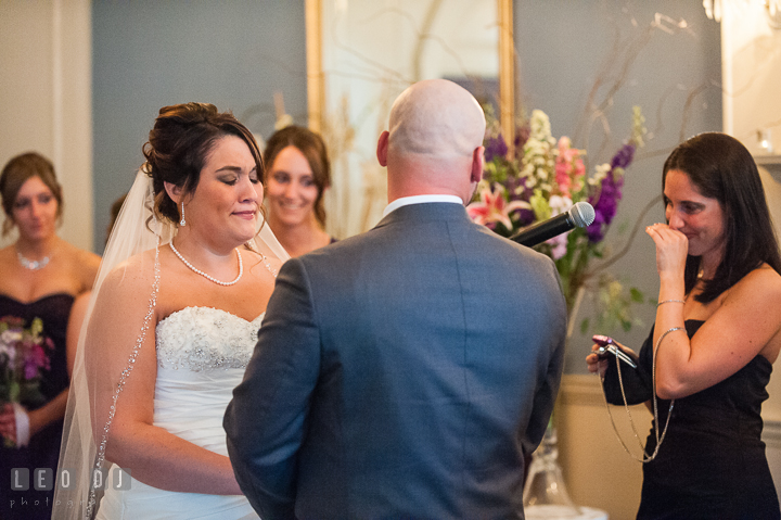 Bride emotional during reading. The Tidewater Inn Wedding, Easton Maryland, ceremony photo coverage by wedding photographers of Leo Dj Photography. http://leodjphoto.com