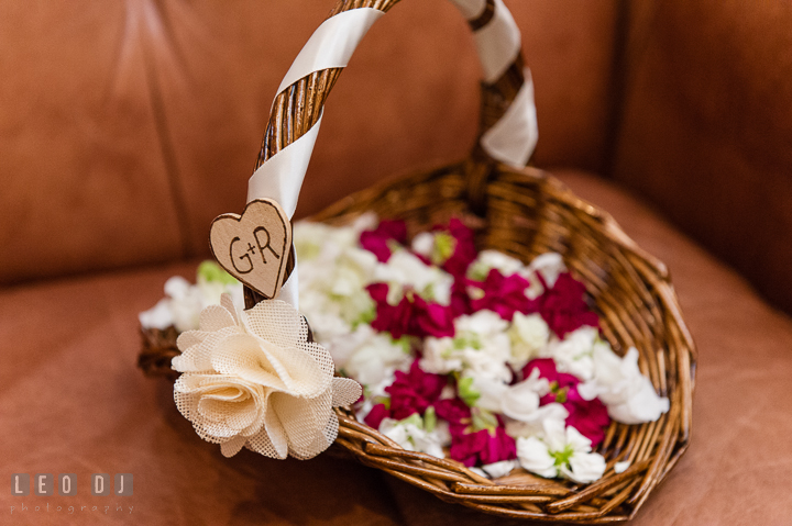 Flower girl's basket. The Tidewater Inn Wedding, Easton Maryland, ceremony photo coverage by wedding photographers of Leo Dj Photography. http://leodjphoto.com