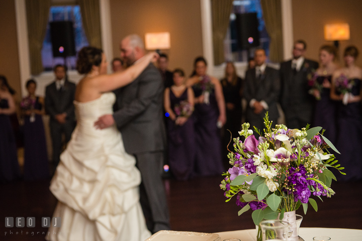 Bride's floral bouquet with Bride and Groom dancing in the back ground. The Tidewater Inn Wedding, Easton Maryland, reception photo coverage by wedding photographers of Leo Dj Photography. http://leodjphoto.com