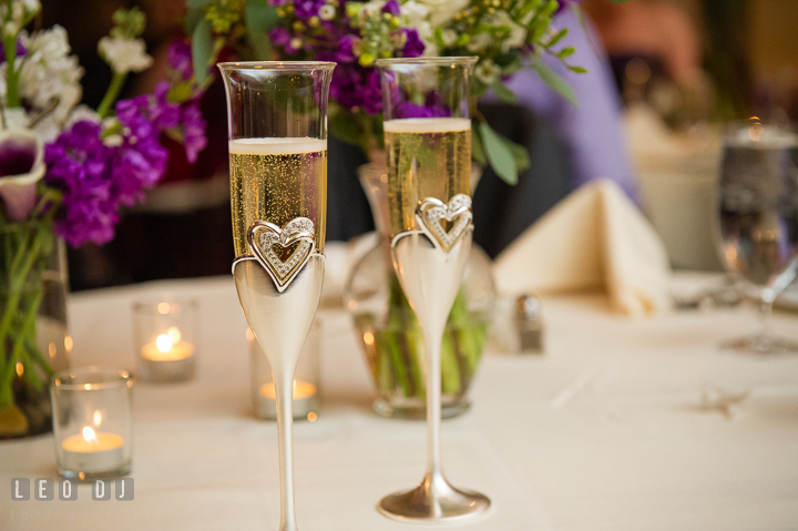 Bride and Groom's champagne glasses for toasts. The Tidewater Inn Wedding, Easton Maryland, reception photo coverage by wedding photographers of Leo Dj Photography. http://leodjphoto.com