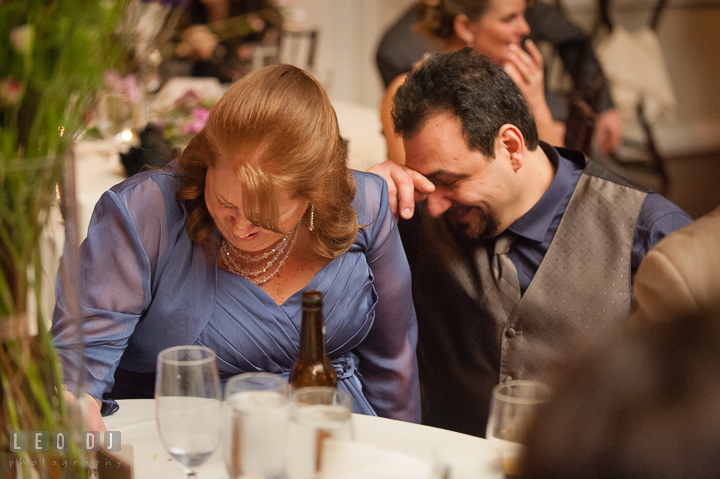 Bride's Mother and Uncle laughing during speech. The Tidewater Inn Wedding, Easton Maryland, reception photo coverage by wedding photographers of Leo Dj Photography. http://leodjphoto.com