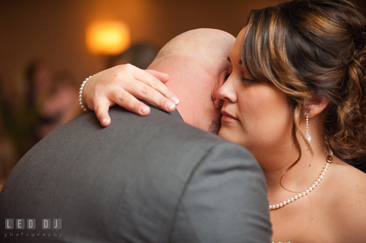 Bride hugged Groom with love. The Tidewater Inn Wedding, Easton Maryland, reception photo coverage by wedding photographers of Leo Dj Photography. http://leodjphoto.com