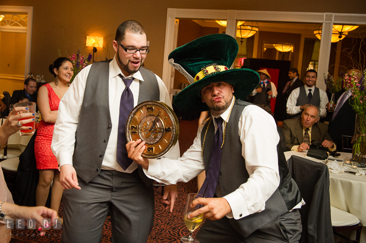 Groomsment wearing silly costumes from Annapolis Photo Booth. The Tidewater Inn Wedding, Easton Maryland, reception photo coverage by wedding photographers of Leo Dj Photography. http://leodjphoto.com