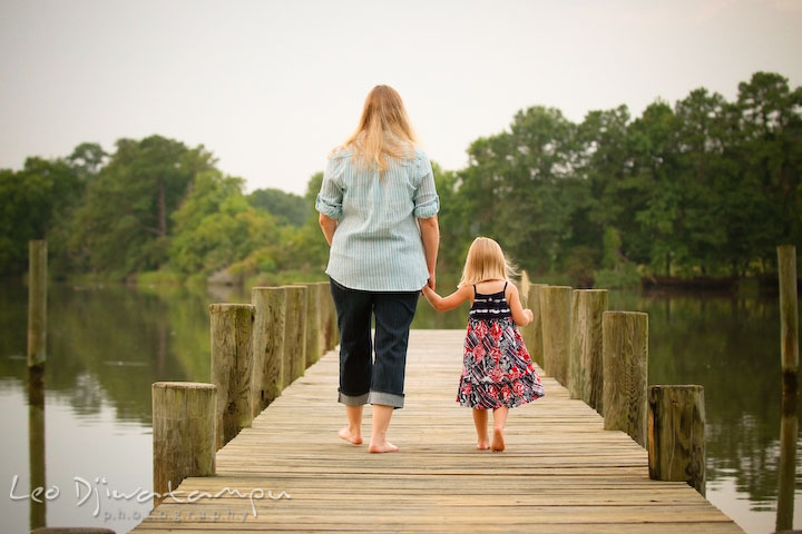 Mother and daughter walking down the pier. Kent Island and Annapolis, Eastern Shore, Maryland Candid Family Maternity Session Photographer