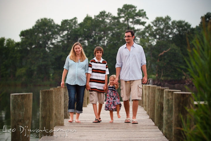Whole family (mother, son, daughter, father) walking on the pier. Kent Island and Annapolis, Eastern Shore, Maryland Candid Family Maternity Session Photographer