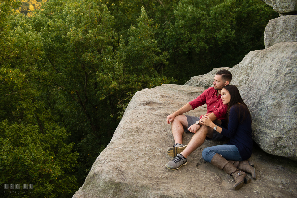 Rocks State Park Bel Air Maryland engaged girl leaning on fiancé and enjoying the view photo by Leo Dj Photography.