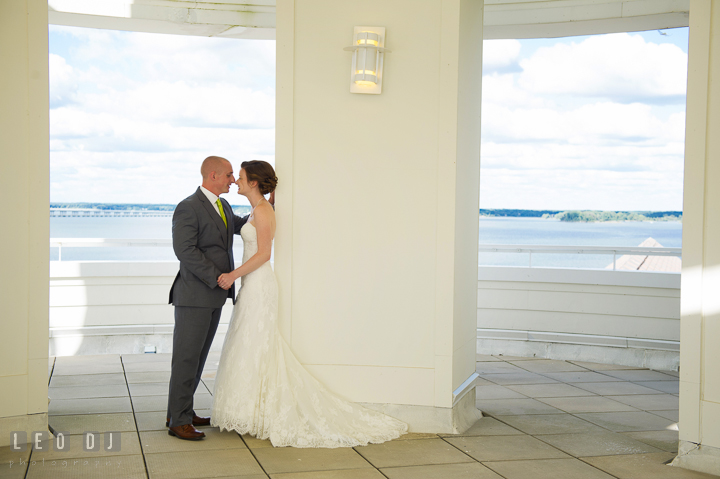 Bride and Groom almost kissed at the Raven's View with water view of Choptank River . Hyatt Regency Chesapeake Bay wedding at Cambridge Maryland, by wedding photographers of Leo Dj Photography. http://leodjphoto.com