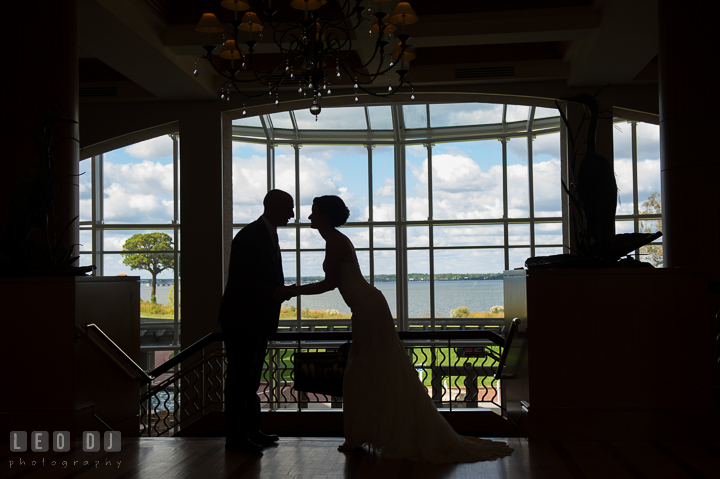 Silhouette of Bride and Groom in the hotel lobby. Hyatt Regency Chesapeake Bay wedding at Cambridge Maryland, by wedding photographers of Leo Dj Photography. http://leodjphoto.com