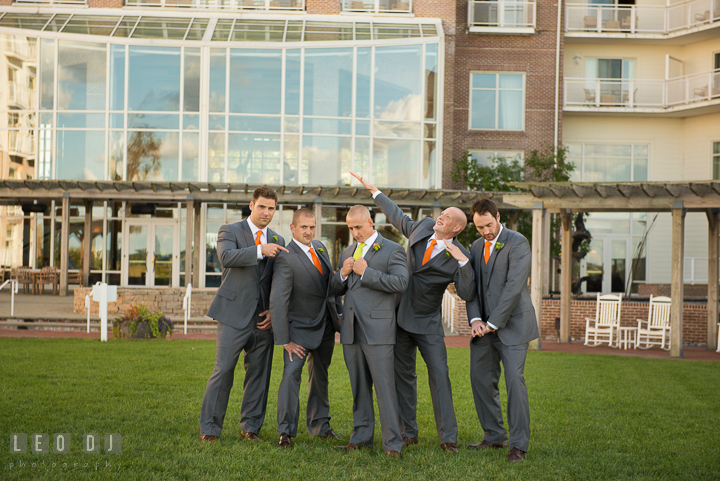 Group shot of Groom, Best Man and Groomsmen doing silly pose. Hyatt Regency Chesapeake Bay wedding at Cambridge Maryland, by wedding photographers of Leo Dj Photography. http://leodjphoto.com