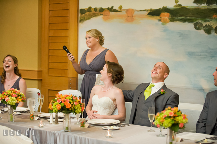 Bride, Groom and Bridesmaid laughing as Maid of Honor delivered her toast speech. Hyatt Regency Chesapeake Bay wedding at Cambridge Maryland, by wedding photographers of Leo Dj Photography. http://leodjphoto.com