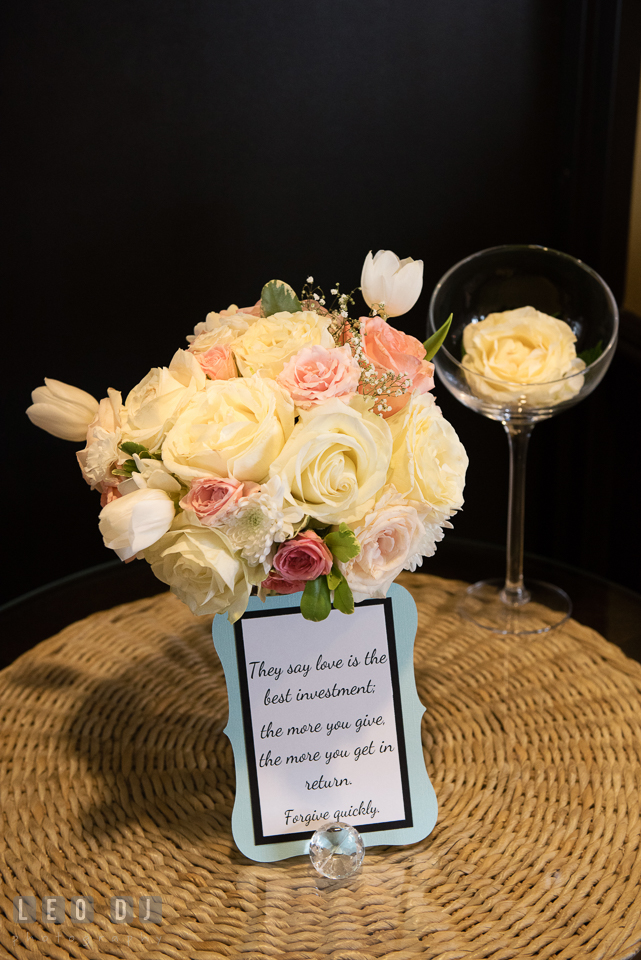 A bouquet of white and pink roses with a card of life advice. Historic Events Annapolis bridal shower decor and event coverage at Annapolis Maryland, by wedding photographers of Leo Dj Photography. http://leodjphoto.com