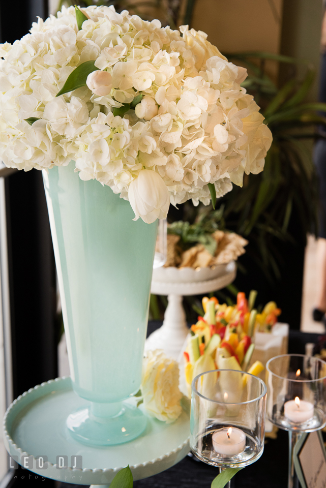 An arrangement of hydrangeas in a tall vase. Historic Events Annapolis bridal shower decor and event coverage at Annapolis Maryland, by wedding photographers of Leo Dj Photography. http://leodjphoto.com