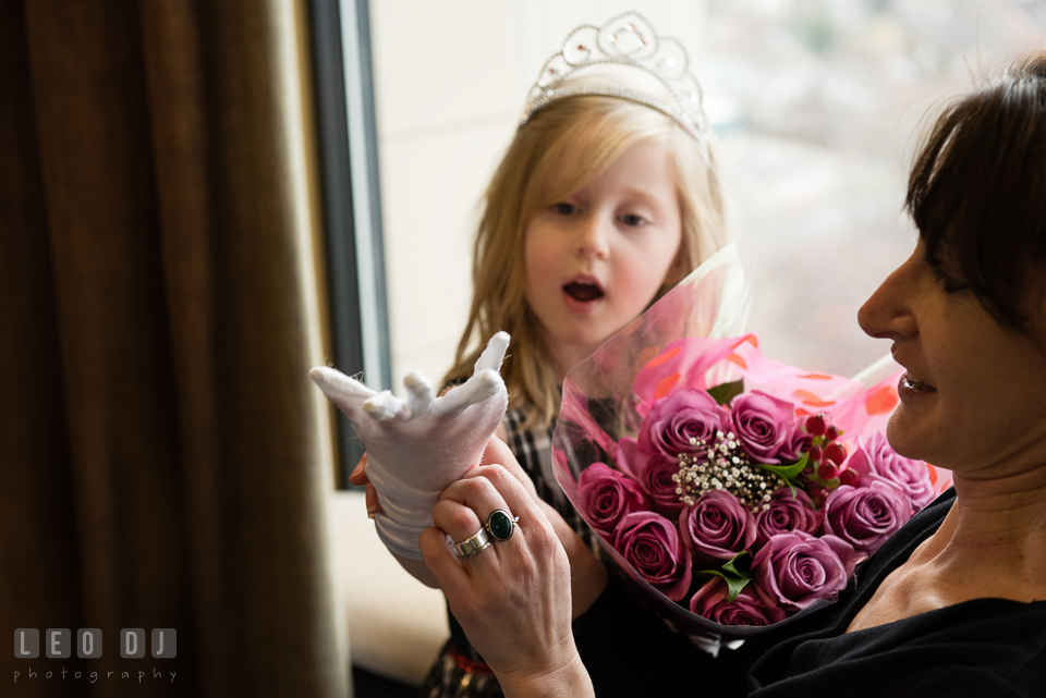 Mother helping daughter put on white gloves. Historic Events Annapolis bridal shower decor and event coverage at Annapolis Maryland, by wedding photographers of Leo Dj Photography. http://leodjphoto.com