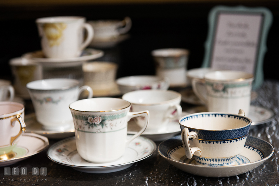 Selections of traditional English tea are served with vintage tea sets to accompany the party. Historic Events Annapolis bridal shower decor and event coverage at Annapolis Maryland, by wedding photographers of Leo Dj Photography. http://leodjphoto.com