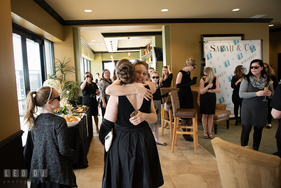 Mother of the Bride-to-be hugging her daugther. Historic Events Annapolis bridal shower decor and event coverage at Annapolis Maryland, by wedding photographers of Leo Dj Photography. http://leodjphoto.com