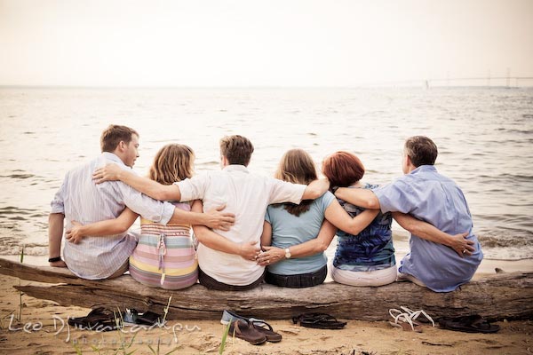 Family at the chesapeake bay beach overlooking the bridge. Kent Island Annapolis Candid Family Portrait Photo Session Photography Eastern Shore Maryland MD DC