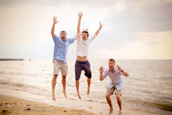 Father and two sons jumping at Chesapeake Bay Beach. Kent Island Annapolis Candid Family Portrait Photo Session Photography Eastern Shore Maryland MD DC