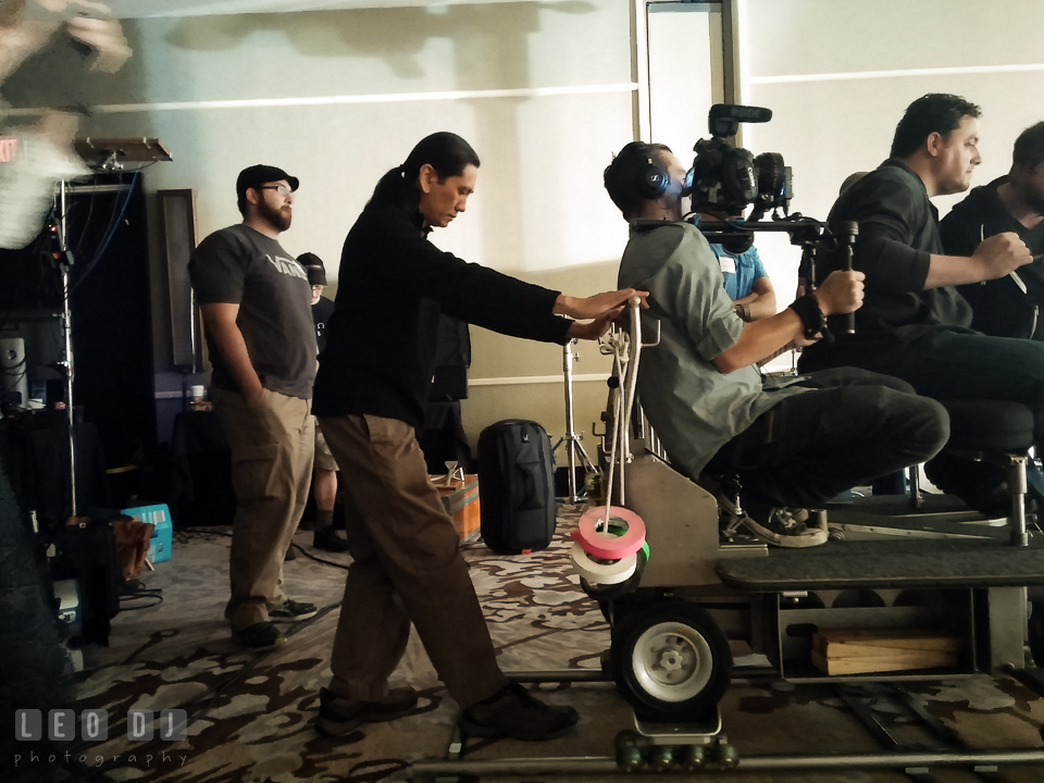 Dolly operator pacing the speed of the camera dolly on the track. Review of MZed Illumination Experience, film making and cinematography Workshop with Hollywood Cinematographer Shane Hurlbut by wedding photographer Leo Dj Photography. http://leodjphoto.com