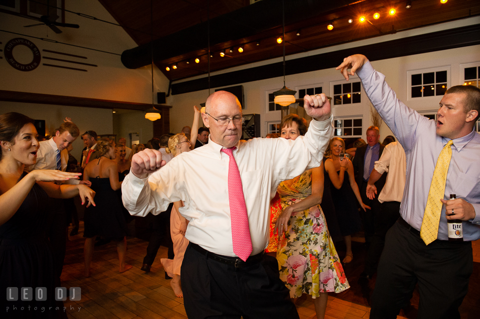 Father of the Bride dancing while being cheered by guests. Kent Island Maryland Chesapeake Bay Beach Club wedding photo, by wedding photographers of Leo Dj Photography. http://leodjphoto.com