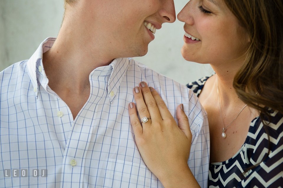 Close up of an engaged girl's diamond engagement ring. Washington DC pre-wedding engagement photo session at Lincoln Memorial, by wedding photographers of Leo Dj Photography. http://leodjphoto.com