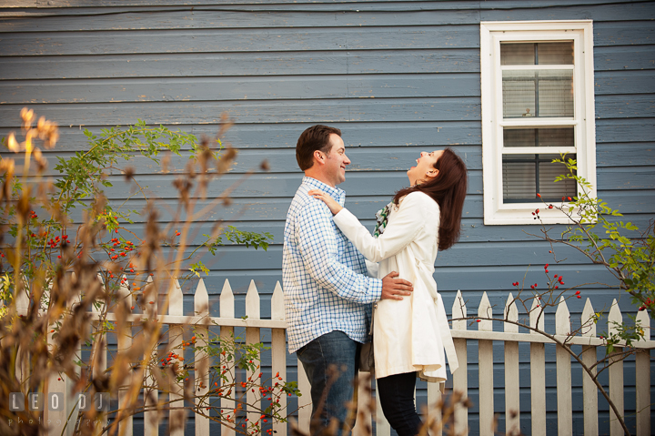 Engaged couple hugging and laughing. Annapolis Eastern Shore Maryland pre-wedding engagement photo session at downtown, by wedding photographers of Leo Dj Photography. http://leodjphoto.com