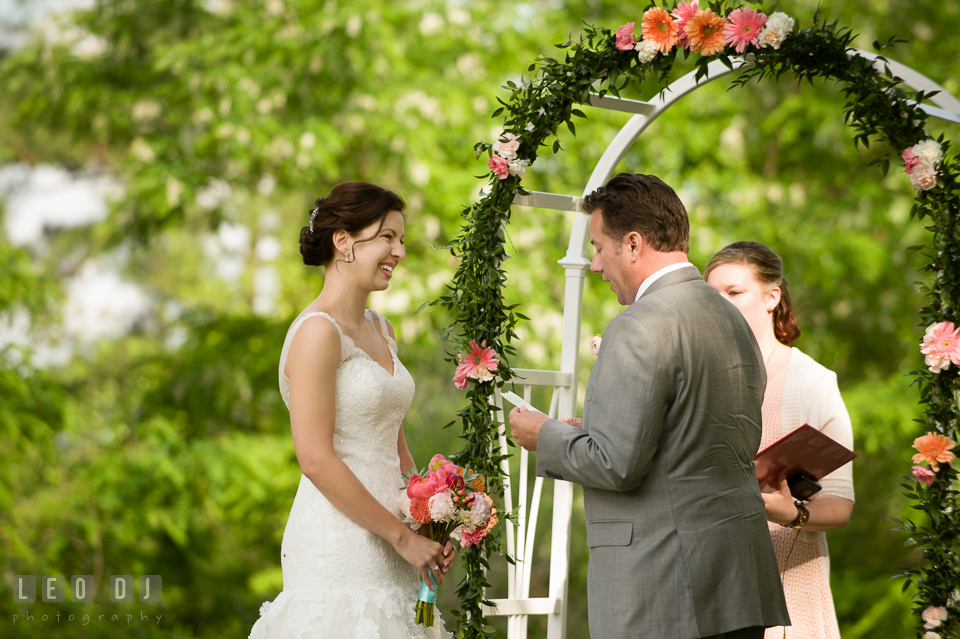 Groom reading his wedding vow. Chesapeake Bay Environmental Center, Eastern Shore Maryland, wedding reception and ceremony photo, by wedding photographers of Leo Dj Photography. http://leodjphoto.com