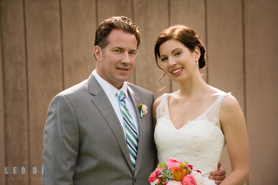 The Bride and Groom posing for the first time as husband and wife after the wedding ceremony. Chesapeake Bay Environmental Center, Eastern Shore Maryland, wedding reception and ceremony photo, by wedding photographers of Leo Dj Photography. http://leodjphoto.com