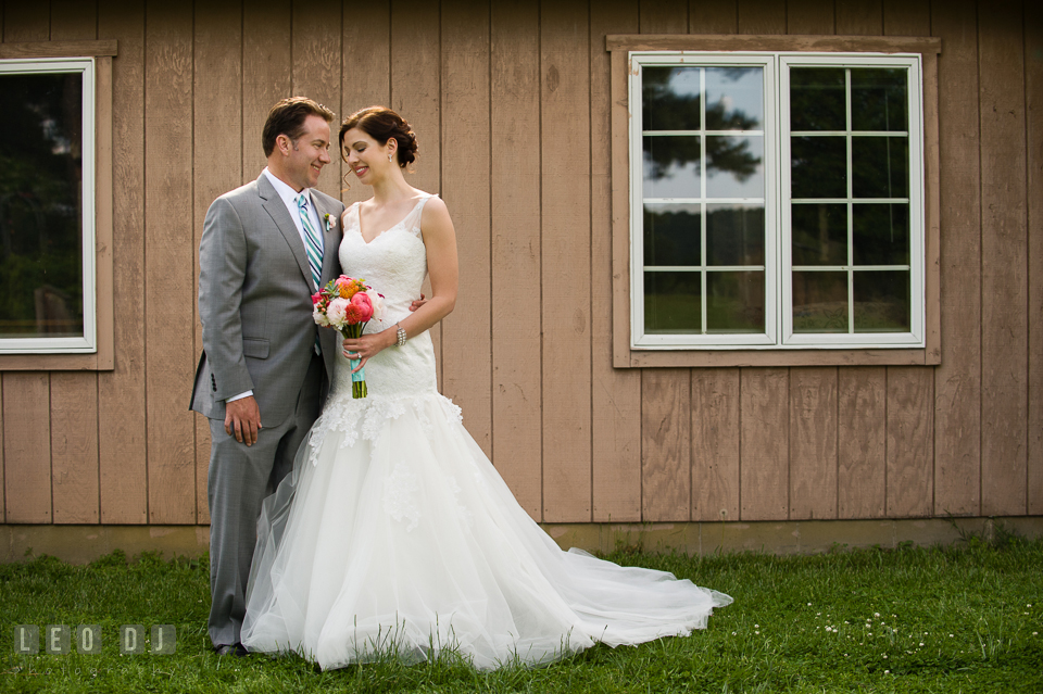The Bride and Groom enjoying their moments together after the wedding ceremony. Chesapeake Bay Environmental Center, Eastern Shore Maryland, wedding reception and ceremony photo, by wedding photographers of Leo Dj Photography. http://leodjphoto.com