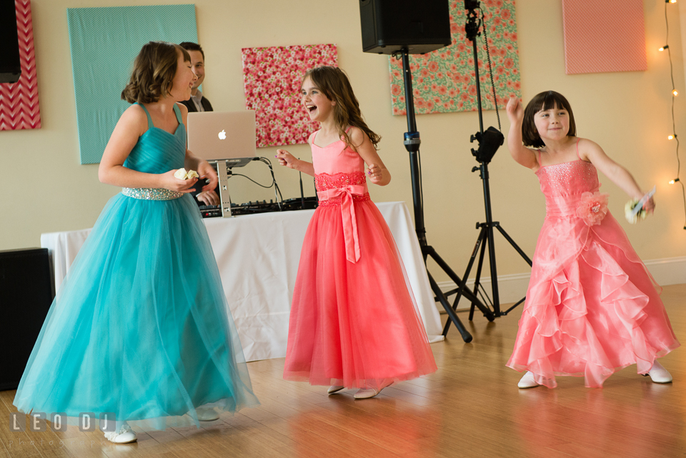 The flower girls dancing along to the introductory song from James Brown, I Got You, I Feel Good. Chesapeake Bay Environmental Center, Eastern Shore Maryland, wedding reception and ceremony photo, by wedding photographers of Leo Dj Photography. http://leodjphoto.com