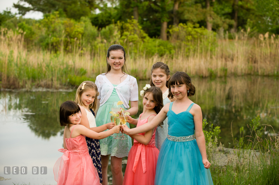 The flower girls toast to the Bride and Groom. Chesapeake Bay Environmental Center, Eastern Shore Maryland, wedding reception and ceremony photo, by wedding photographers of Leo Dj Photography. http://leodjphoto.com