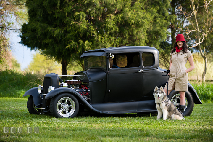 Girl and her dog posing by an old Ford model car. Model portrait session with Brittany from Beyond the Veil music Band and her Siberian Husky pet dog at Kent Island, Maryland Eastern Shore by photographer Leo Dj Photography.