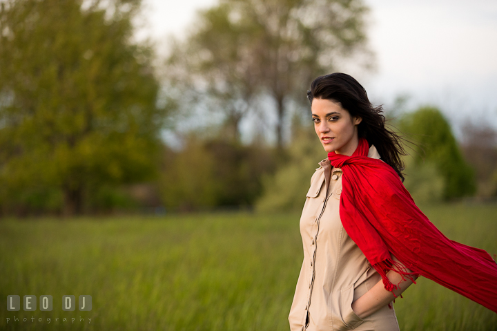 Girl with red scarf in a grass meadow. Model portrait session with Brittany from Beyond the Veil music Band and her Siberian Husky pet dog at Kent Island, Maryland Eastern Shore by photographer Leo Dj Photography.