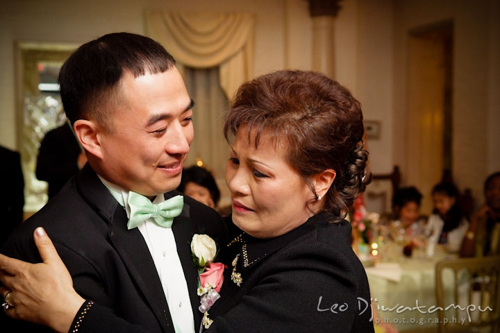 Groom and mother gets emotional while doing mother and son dance. Ceresville Mansion Frederick Maryland Wedding Photo by wedding photographer Leo Dj Photography