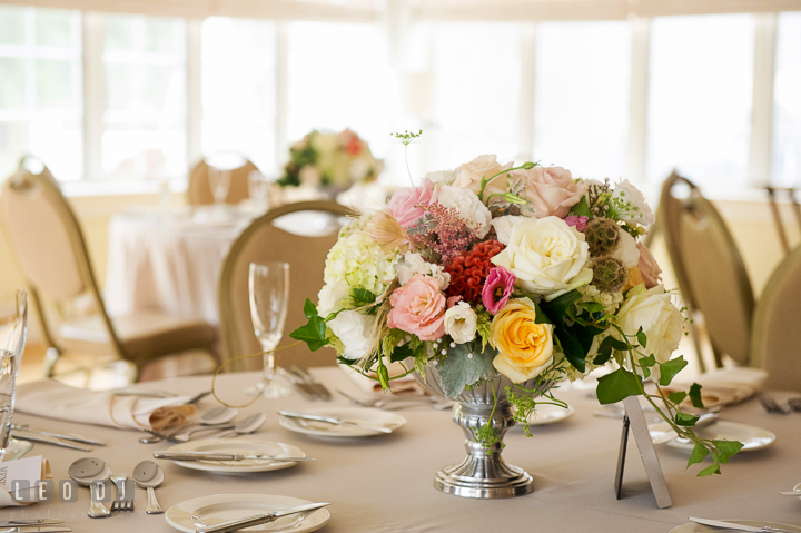 Table setting and pastel roses flower centerpiece by Mobtwon Florals. Aspen Wye River Conference Centers wedding at Queenstown Maryland, by wedding photographers of Leo Dj Photography. http://leodjphoto.com