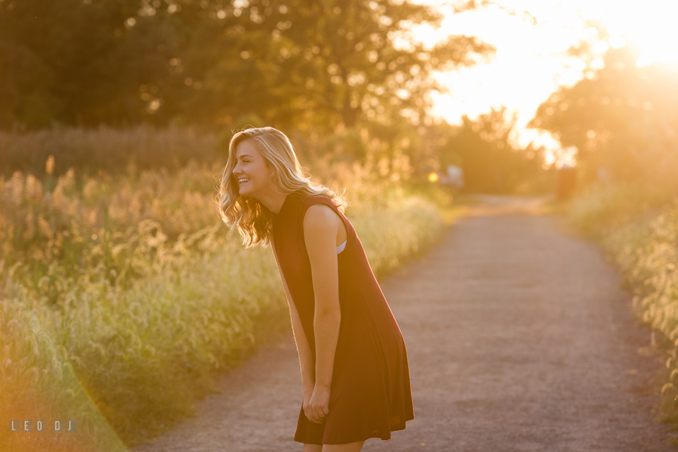 Kent Island High School Maryland senior on trail laughing photo by Leo Dj Photography