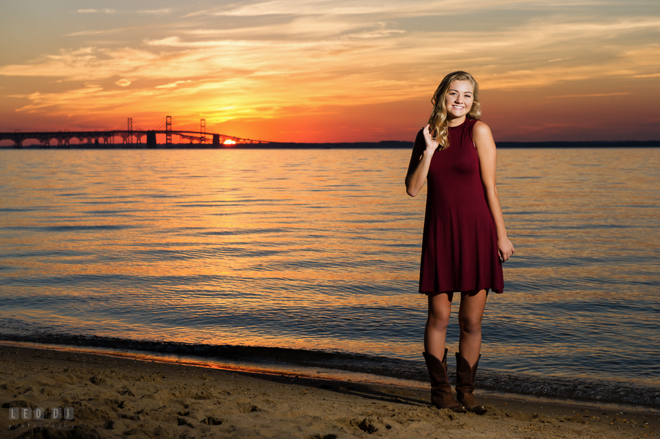 Kent Island High School Maryland senior at sunset at Chesapeake Bay beach with bridge background photo by Leo Dj Photography