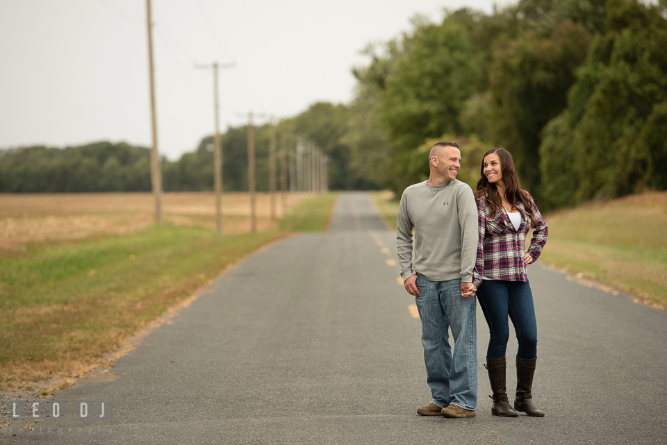 Wye Island Queenstown Maryland engaged couple holding hands and smiling photo by Leo Dj Photography.