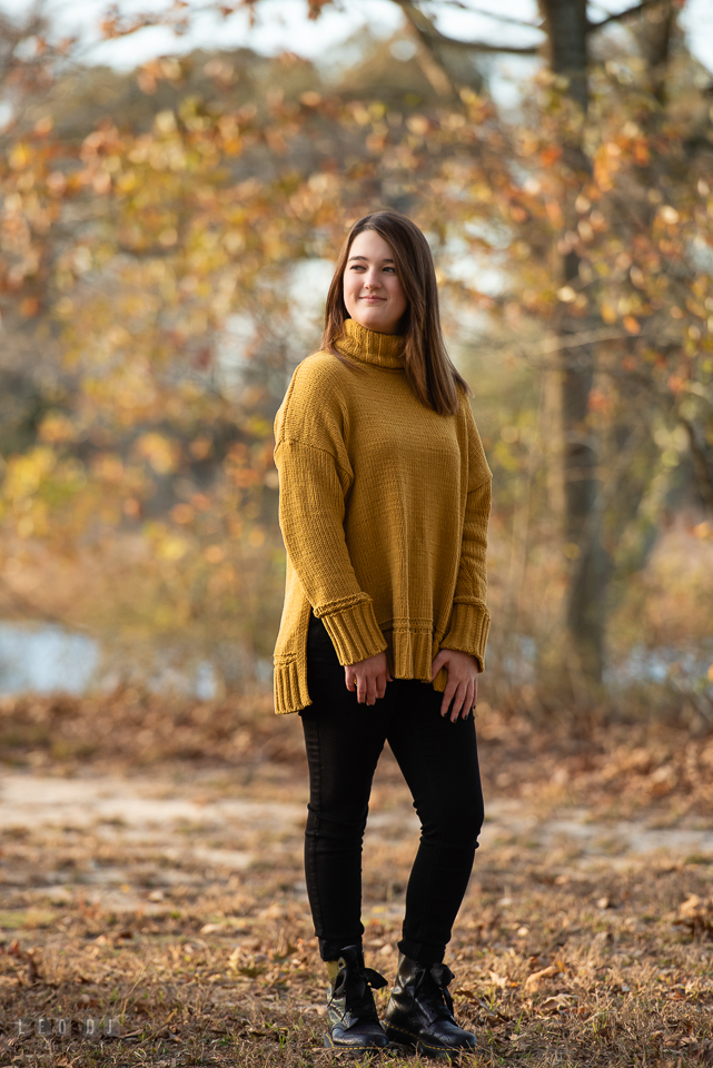 Kent Island High School Maryland senior by a creek in autumn photo by Leo Dj Photography.