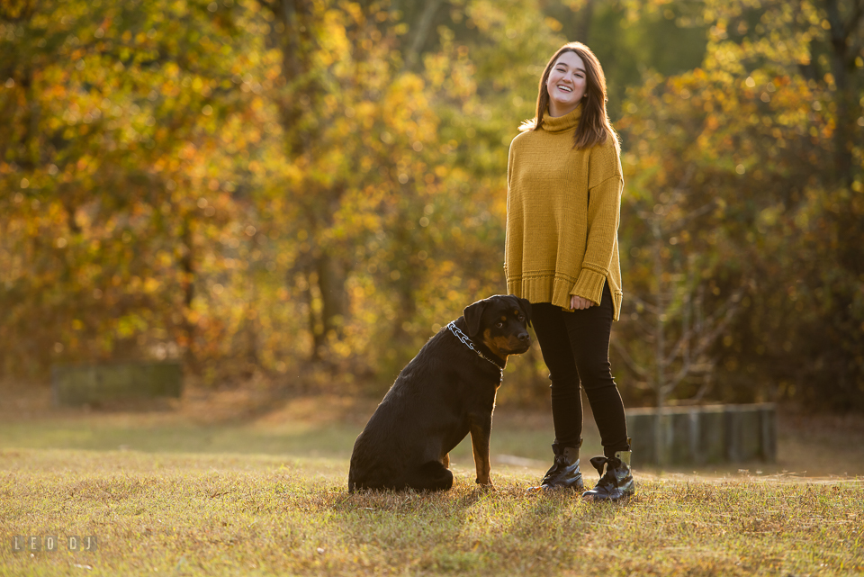 Kent Island High School Maryland senior smiling with her rottweiler dog photo by Leo Dj Photography.